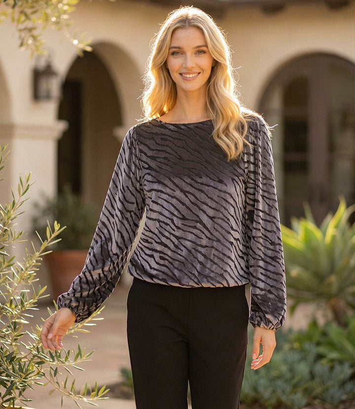 Black and silver blouson sleeve velvet burnout boatneck top with relaxed fit and elasticized cuffs