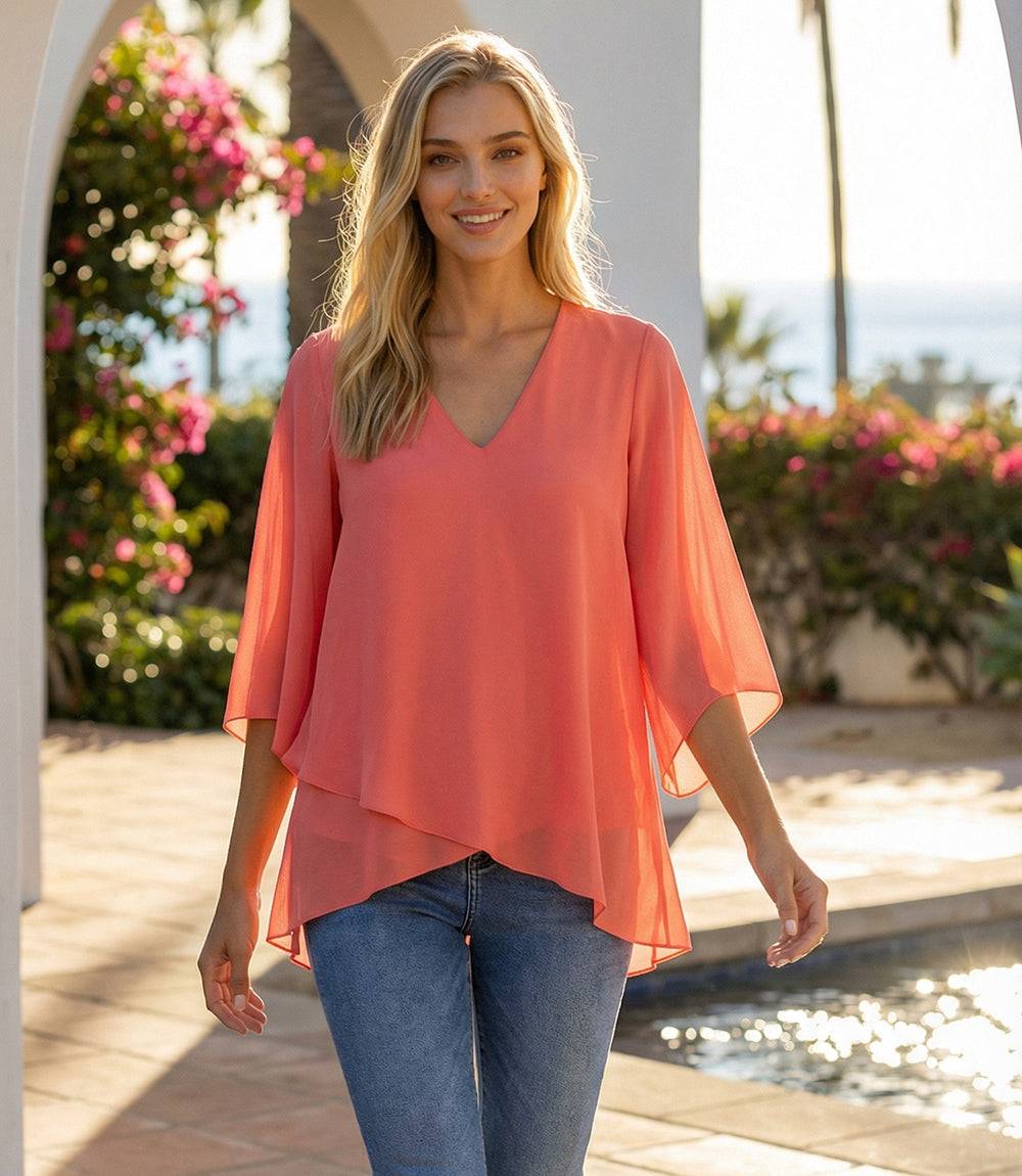 Bracelet Sleeve Asymmetric Top in silky crepe with flare sleeves and layered asymmetrical hem