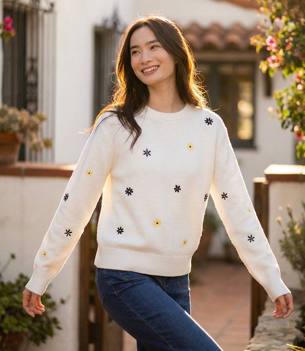 Black Embroidered Daisy Crewneck Sweater with long sleeves and relaxed fit