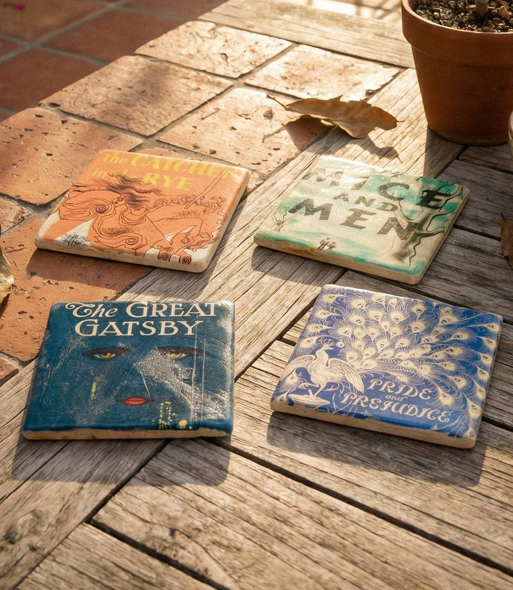 Set of 4 Literature Lover Coasters with vintage classic novel covers on marble