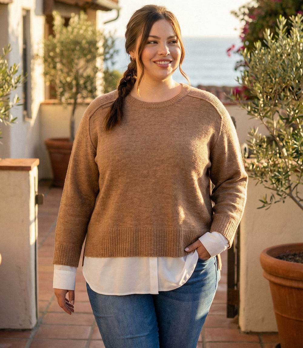 Plus size layered crewneck sweater with raglan sleeves and contrast shirttail hem detail