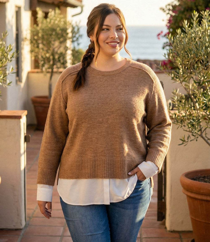 Plus size layered crewneck sweater with raglan sleeves and contrast shirttail hem detail