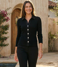 Woman wearing ribbed long sleeve button front top with contrast collar and slim fit
