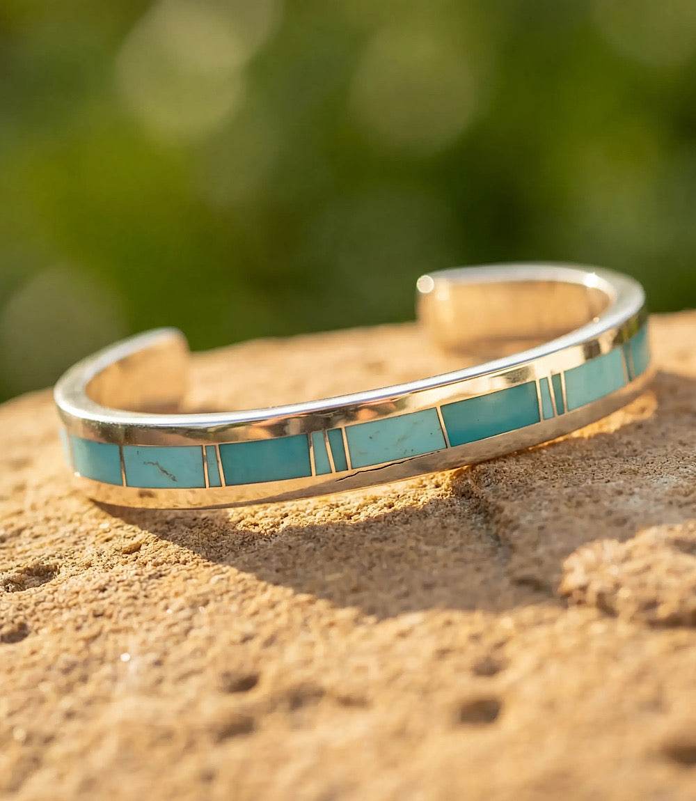 Turquoise Inlay Cuff Bracelet in sterling silver with vibrant turquoise stones and polished finish