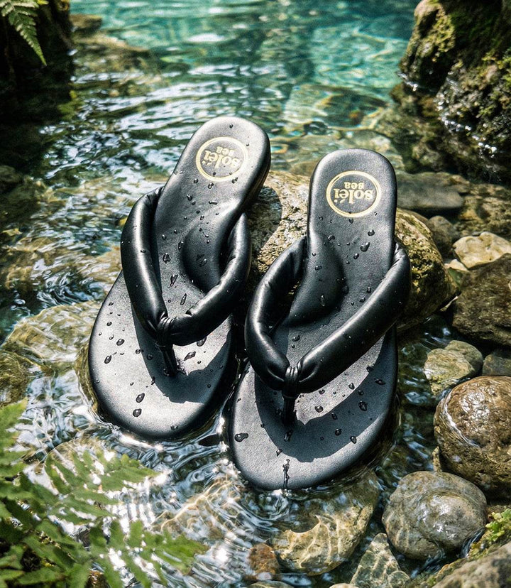 Solei Sea Gisel Sandals black slip-on with plush pillow strap and non-slip rubber sole for comfort and traction