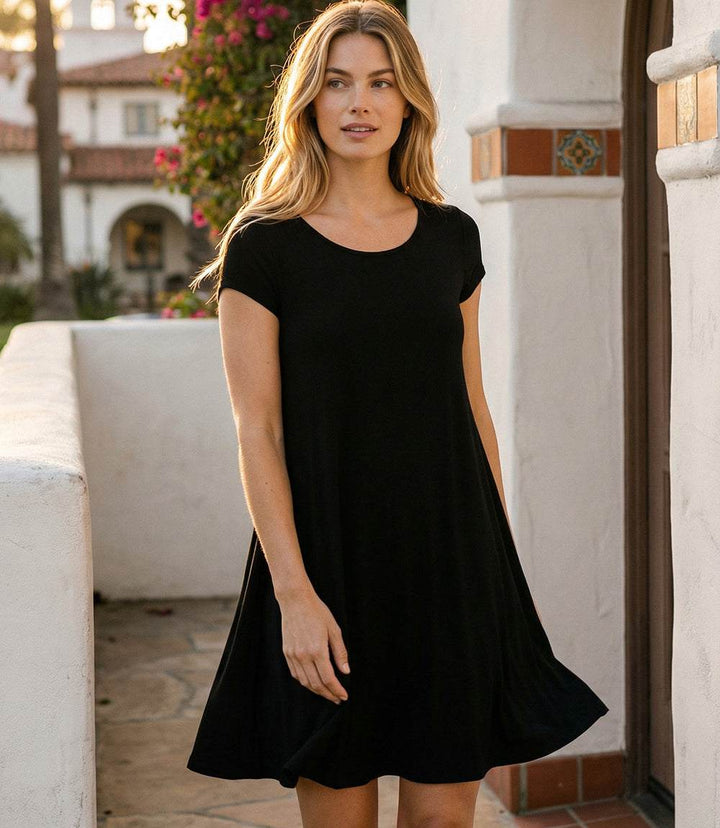 Maggie Trapeze Dress with cap sleeves, boat neckline, and high-low hem in stretch jersey knit
