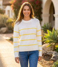 Stripe crewneck sweater with soft yellow horizontal stripes and relaxed fit for casual layering