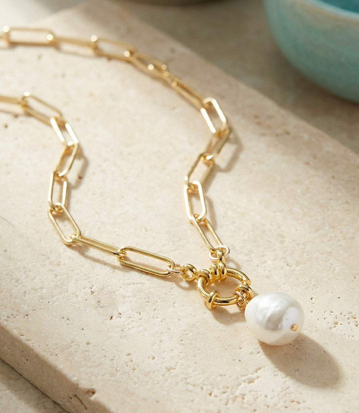 Pearl toggle necklace with gold-toned paperclip chain and luminous pearl drop pendant