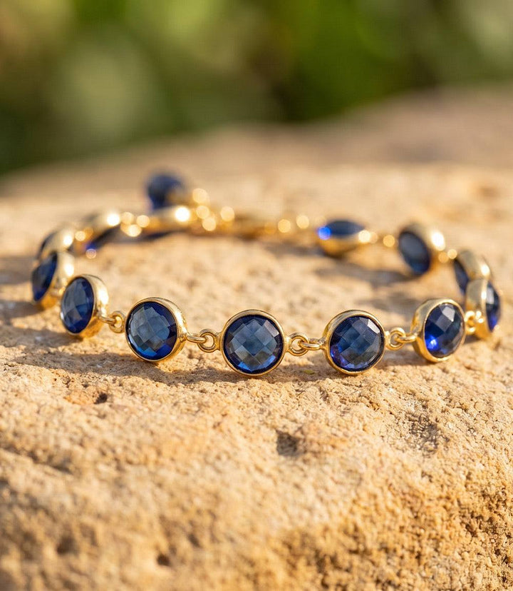 Sapphire crystal bracelet with blue crystals and gold-tone adjustable clasp