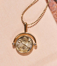 Gold Compass Swivel Pendant Necklace with spinning center and arrows design, waterproof and tarnish-resistant, 18-inch chain