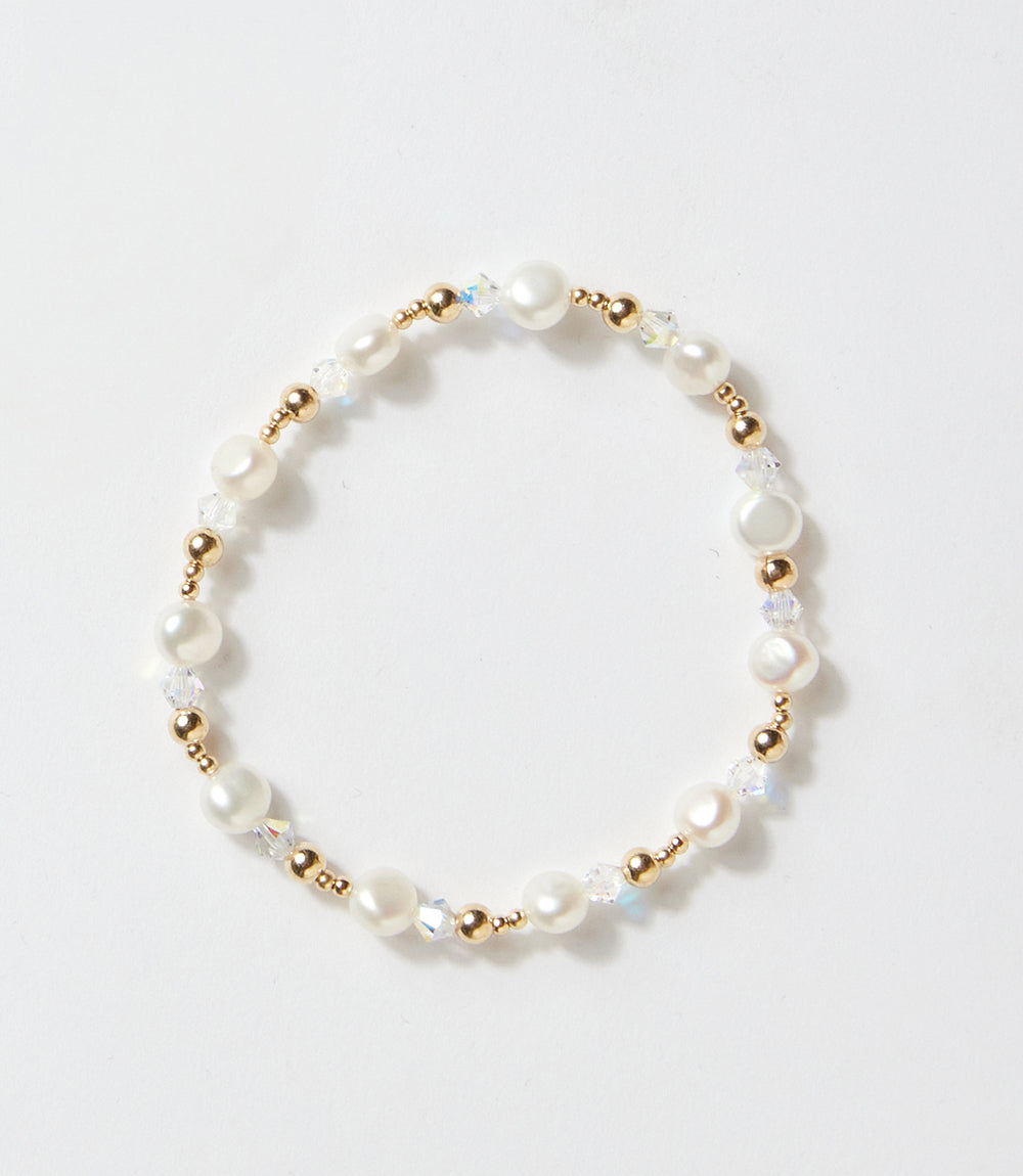 Pearl and crystal beaded bracelet with 14K gold-filled beads on white background