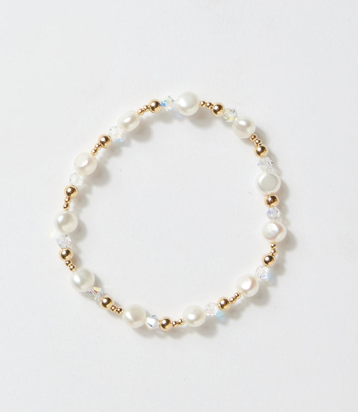 Pearl and crystal beaded bracelet with 14K gold-filled beads on white background