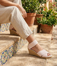 Pink Charleston Shoe Co. Cannon Stripe Wedge Sandals with elastic ankle strap and round toe design