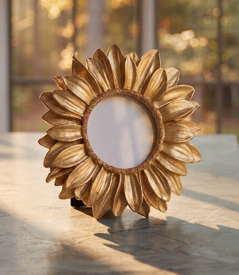 Gold sunflower photo frame with sculpted petals and radiant gold finish, 7-inch diameter, holds 3x3 inch photo
