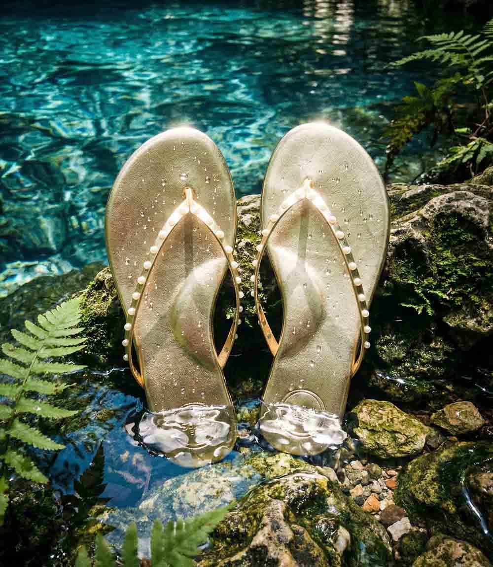 Gold Solei Sea Indie Pearl Thong Sandals with pearl straps and cushioned footbed.