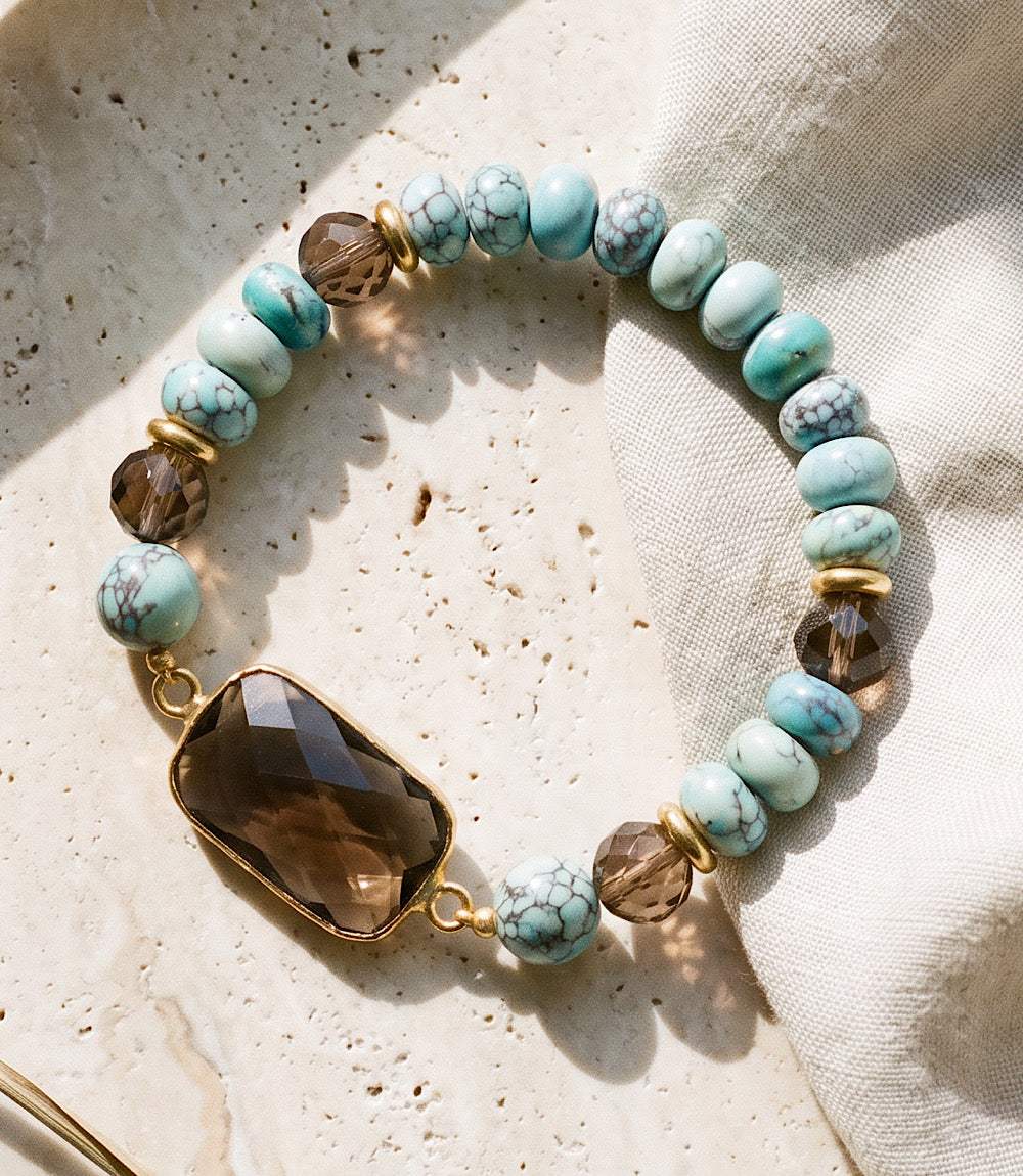 Beaded turquoise and brown gemstone bracelet with gold plated brass centerpiece