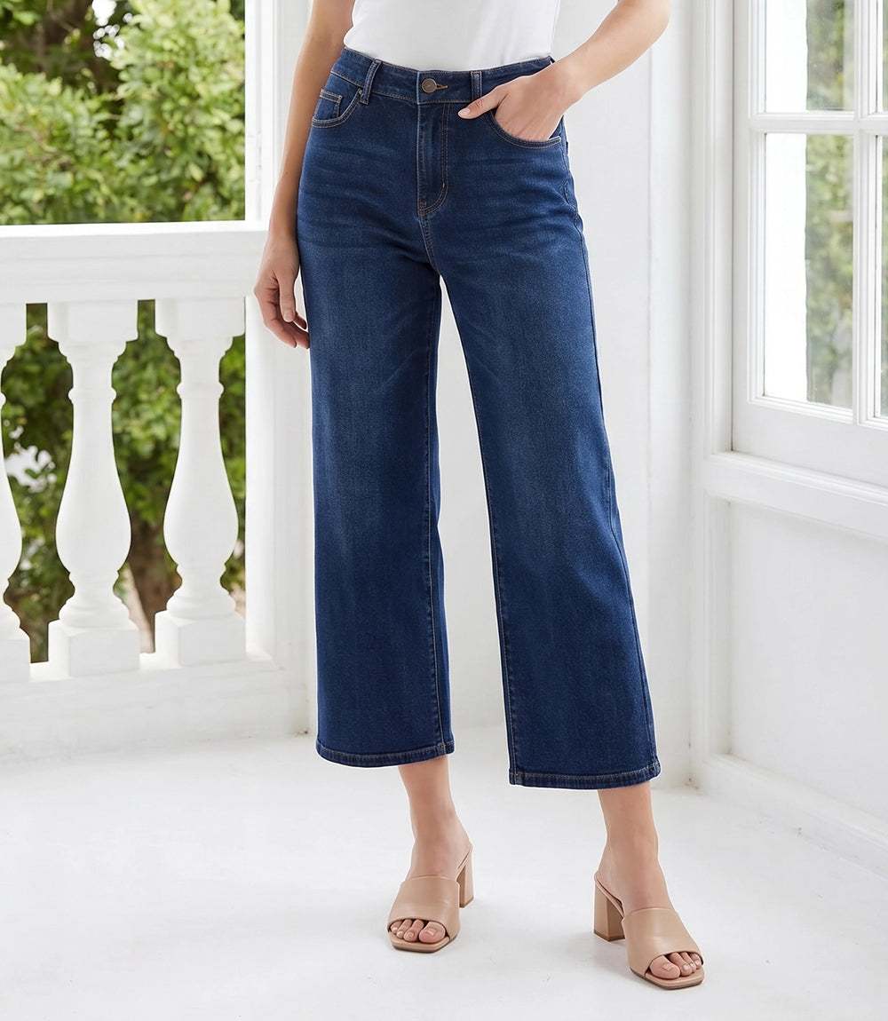 Wide leg cropped jeans in dark wash stretch denim with high-rise waist and relaxed fit