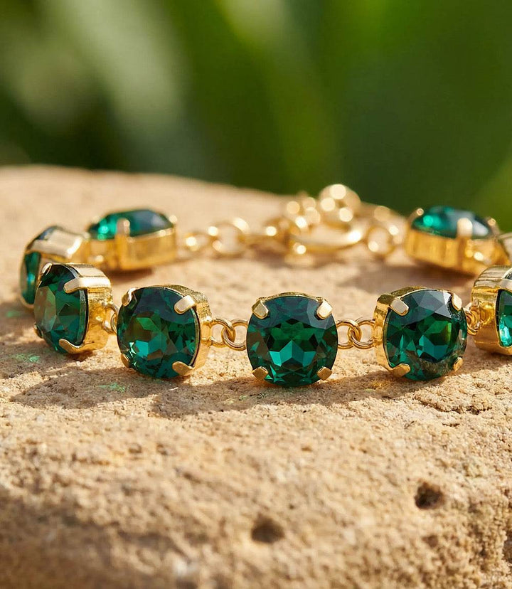 Large crystal bracelet with oversized emerald Swarovski crystals and gold-plated brass design