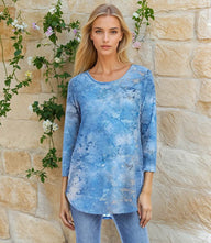 Blue 3/4 sleeve burnout shirttail top with scoop neckline and relaxed fit