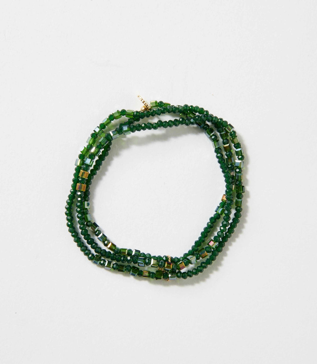 Emerald green crystal beaded stretch bracelet with gold accents