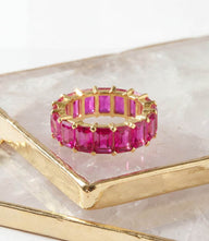 Baguette gemstone ring with fuchsia cubic zirconia in gold plated sterling silver