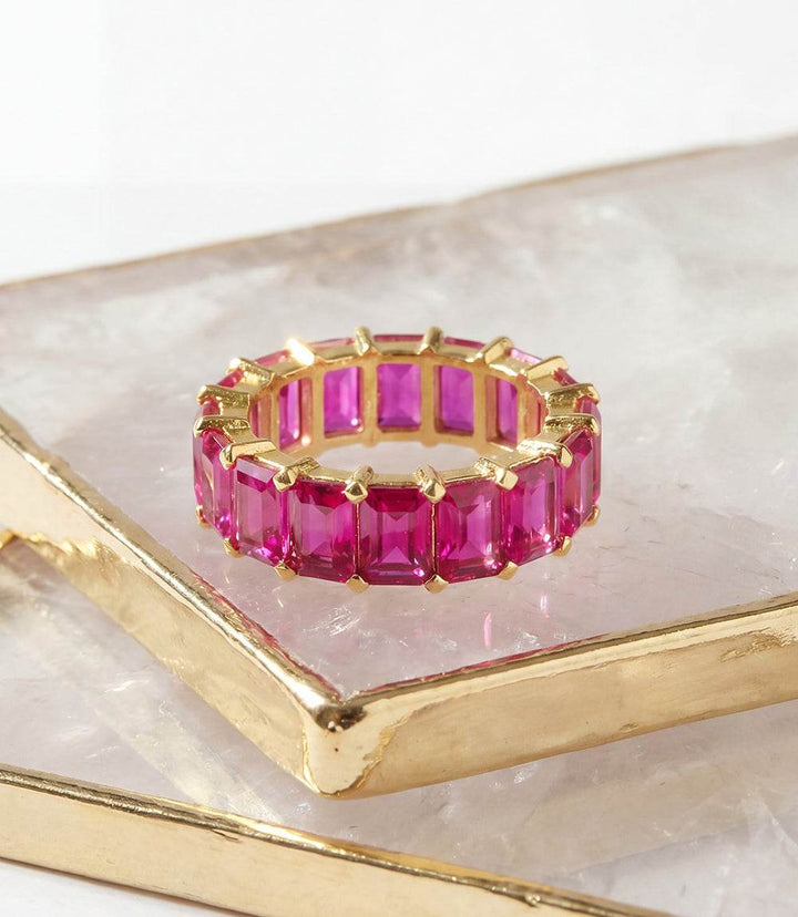 Baguette gemstone ring with fuchsia cubic zirconia in gold plated sterling silver