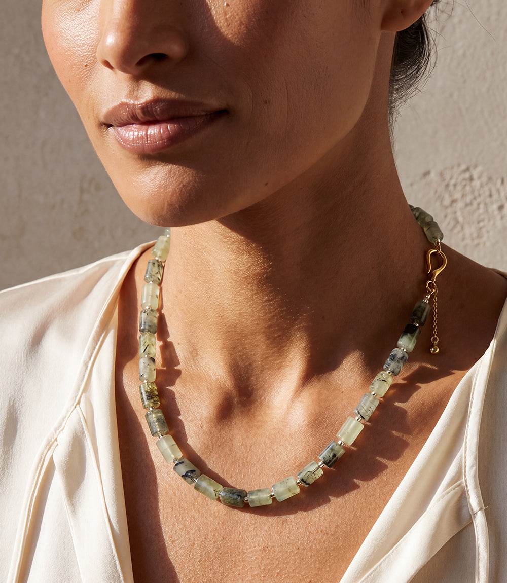 Beaded Necklace with faceted rectangular and square green beads accented by polished gold-tone clasp and extender chain