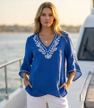 Bracelet sleeve embroidered asymmetric top with V-neck and flare sleeves in lightweight linen blend