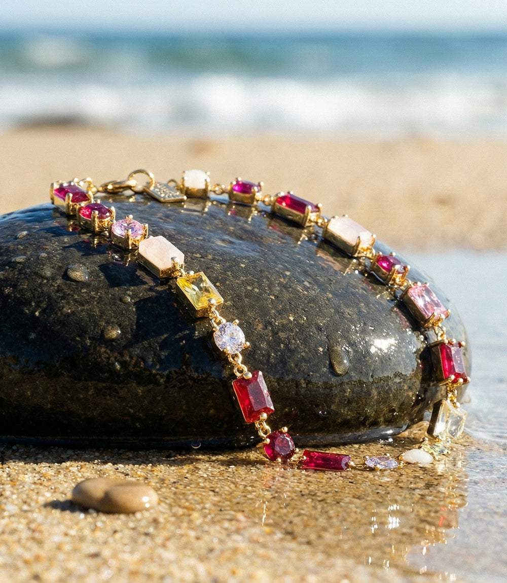 Calypso Crystal Bracelet with red, pink, and multi-colored cubic zirconia stones set in 4K gold vermeil featuring a natural rainbow moonstone