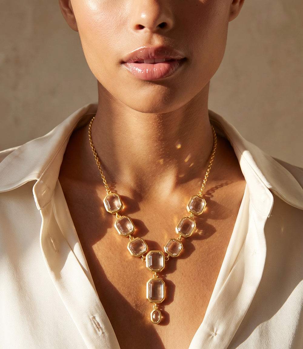 Crystal Lariat Necklace with faceted stones and matte gold settings, adjustable length with lobster clasp closure