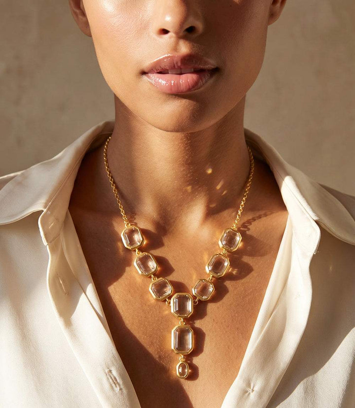 Crystal Lariat Necklace with faceted stones and matte gold settings, adjustable length with lobster clasp closure
