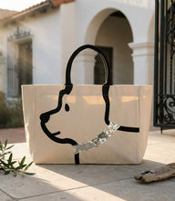Canvas Dog Tote Bag with playful dog graphic and silver sequin collar, sturdy handles for easy carrying