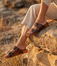Dolce Vita Julio Buckle Slide Sandals in tortoise with adjustable buckles and contoured footbed