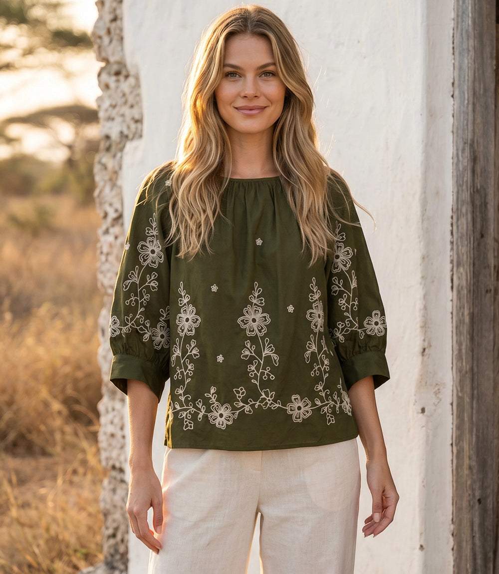 Cream embroidered blouson sleeve top with scoop neck and relaxed fit in cotton poplin