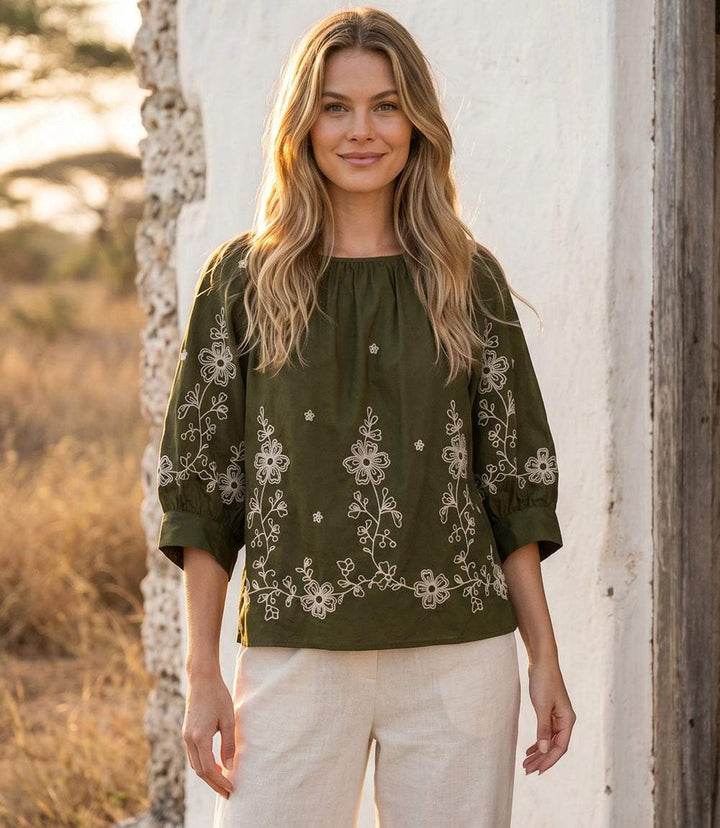 Cream embroidered blouson sleeve top with scoop neck and relaxed fit in cotton poplin