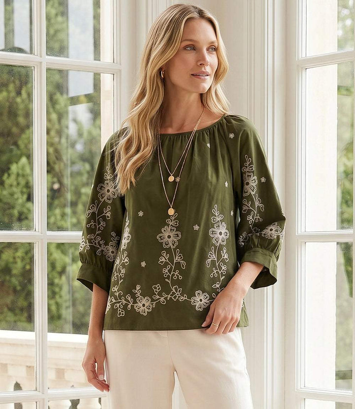 Embroidered blouson sleeve top in crisp cotton poplin with gathered neckline and cream embroidery detail