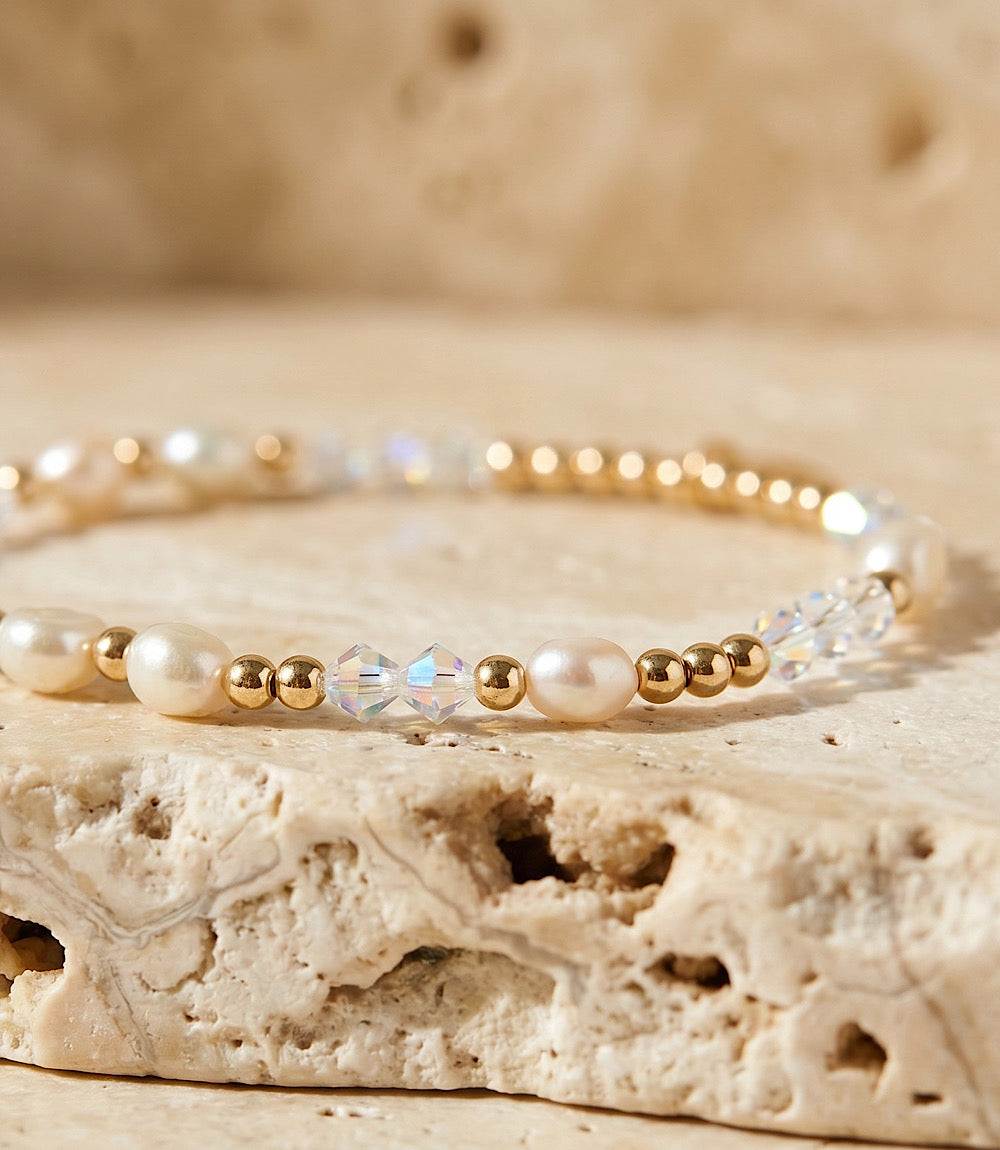 Crystal beaded bracelet with freshwater pearls and 14K gold-filled beads on stretch elastic