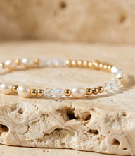 Crystal beaded bracelet with freshwater pearls and 14K gold-filled beads on stretch elastic