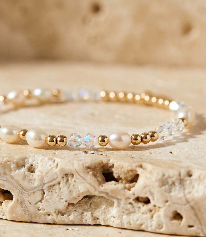 Crystal beaded bracelet with freshwater pearls and 14K gold-filled beads on stretch elastic