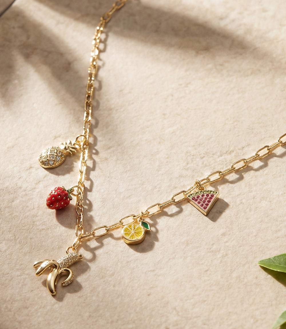 Fruit Salad Charm Necklace with gold chain and colorful fruit charms including banana, strawberry, pineapple, lemon, and watermelon