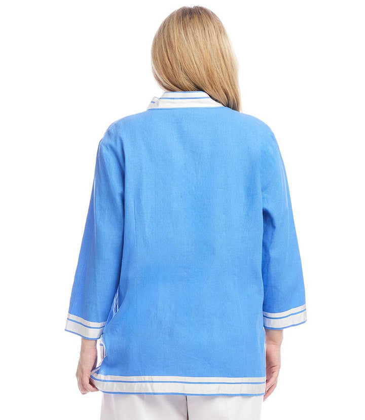 Plus Size The St. Tropez Tunic in blue linen blend with contrast grosgrain ribbon trim, relaxed fit, and mandarin collar shown from the back