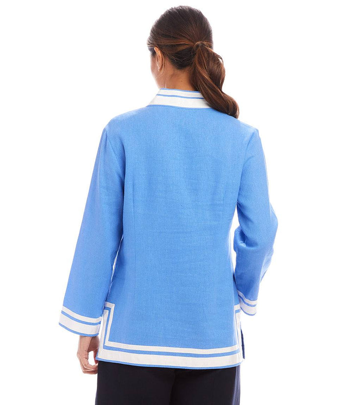 Back view of The St. Tropez Tunic in light blue linen blend with white grosgrain ribbon trim and relaxed fit.