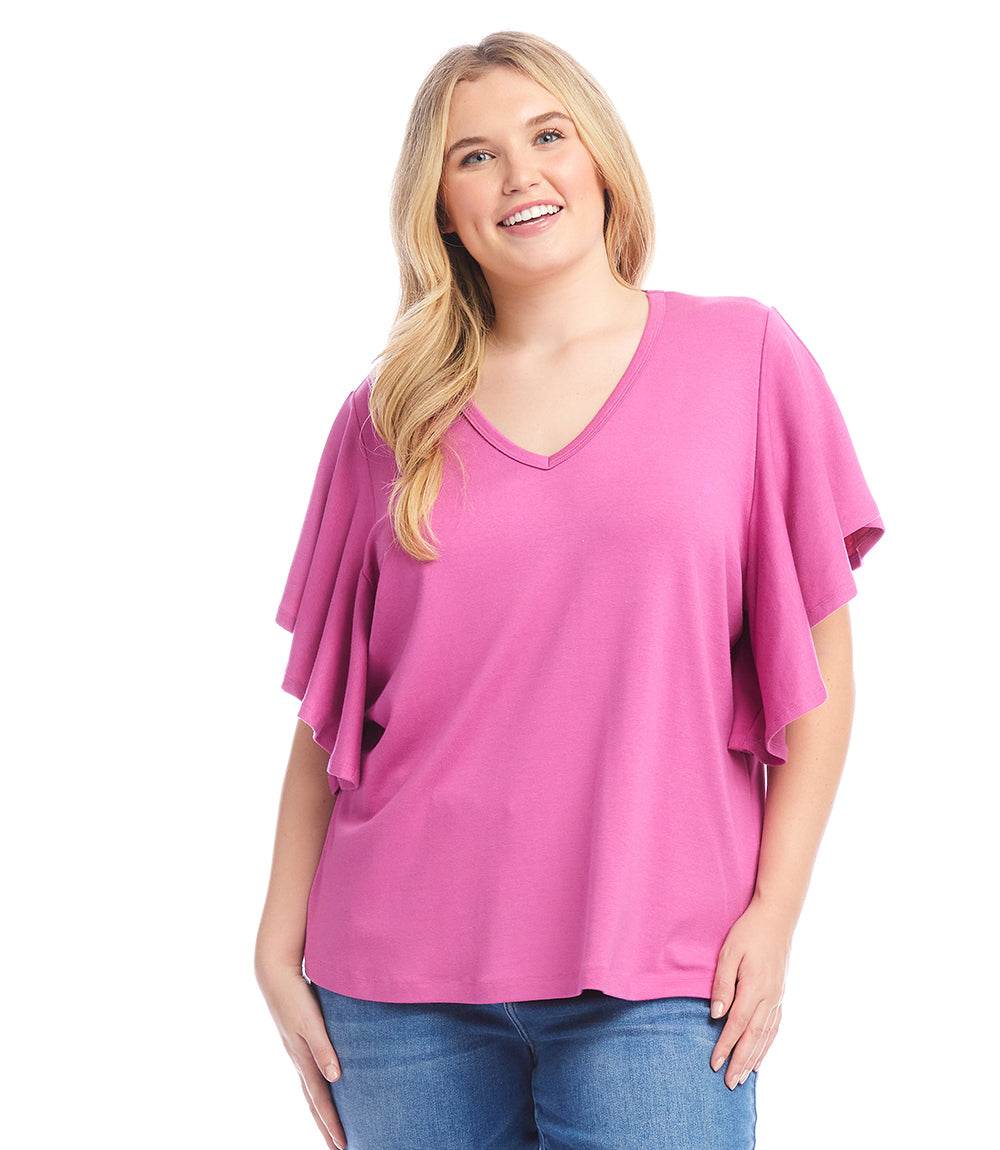 Plus size flutter sleeve top in pink with v-neck and ruffled sleeves made from organic cotton blend