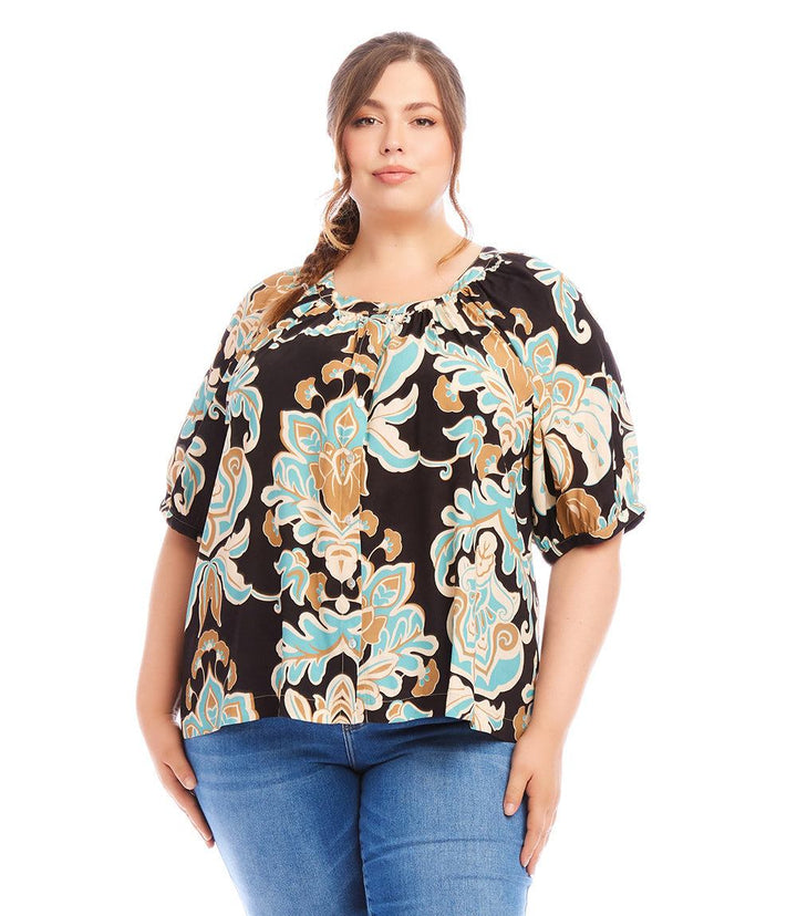 Plus size short sleeve peasant top with blue and brown floral print and button front closure