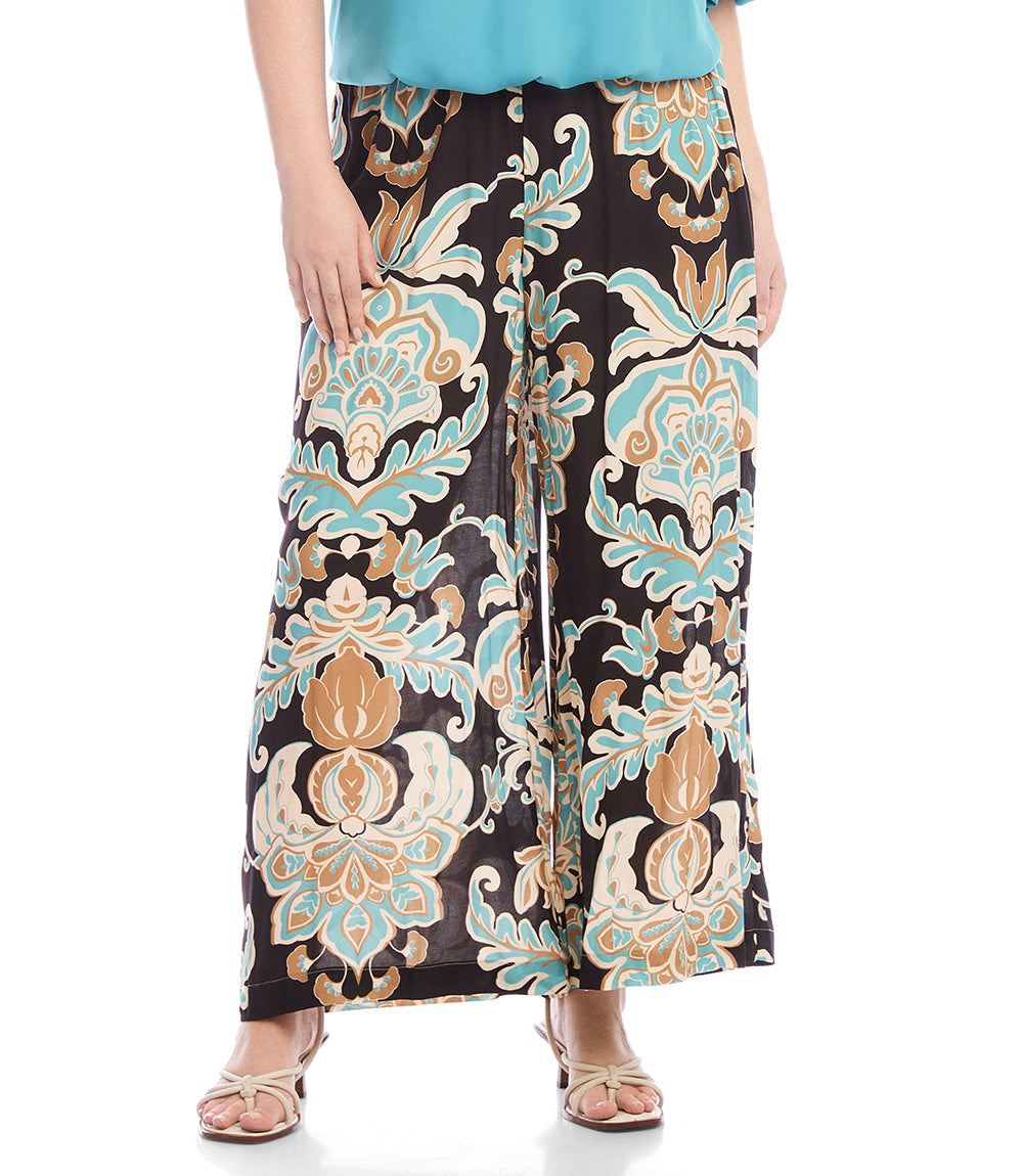Plus size wide-leg pants in black with blue and brown damask flower print made of crepe viscose material with elastic waist and side pockets.