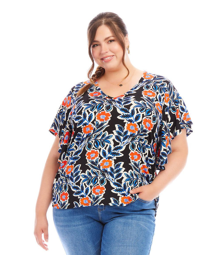 Plus size flutter sleeve V-neck top with vibrant poppy flower print on black background, made of soft stretchy fabric.