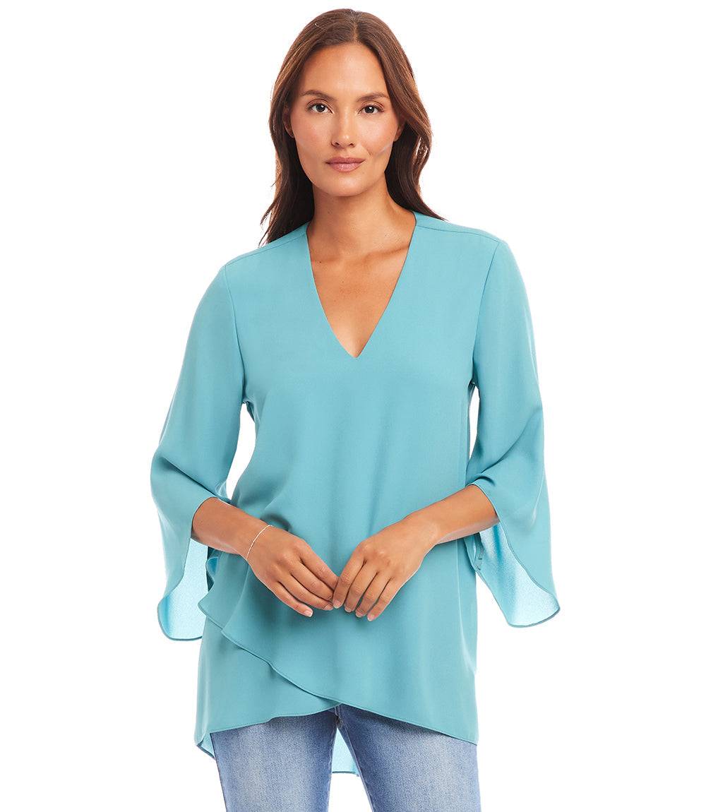 Petite size bracelet sleeve asymmetric top in silky crepe with V-neck and layered hem in light blue