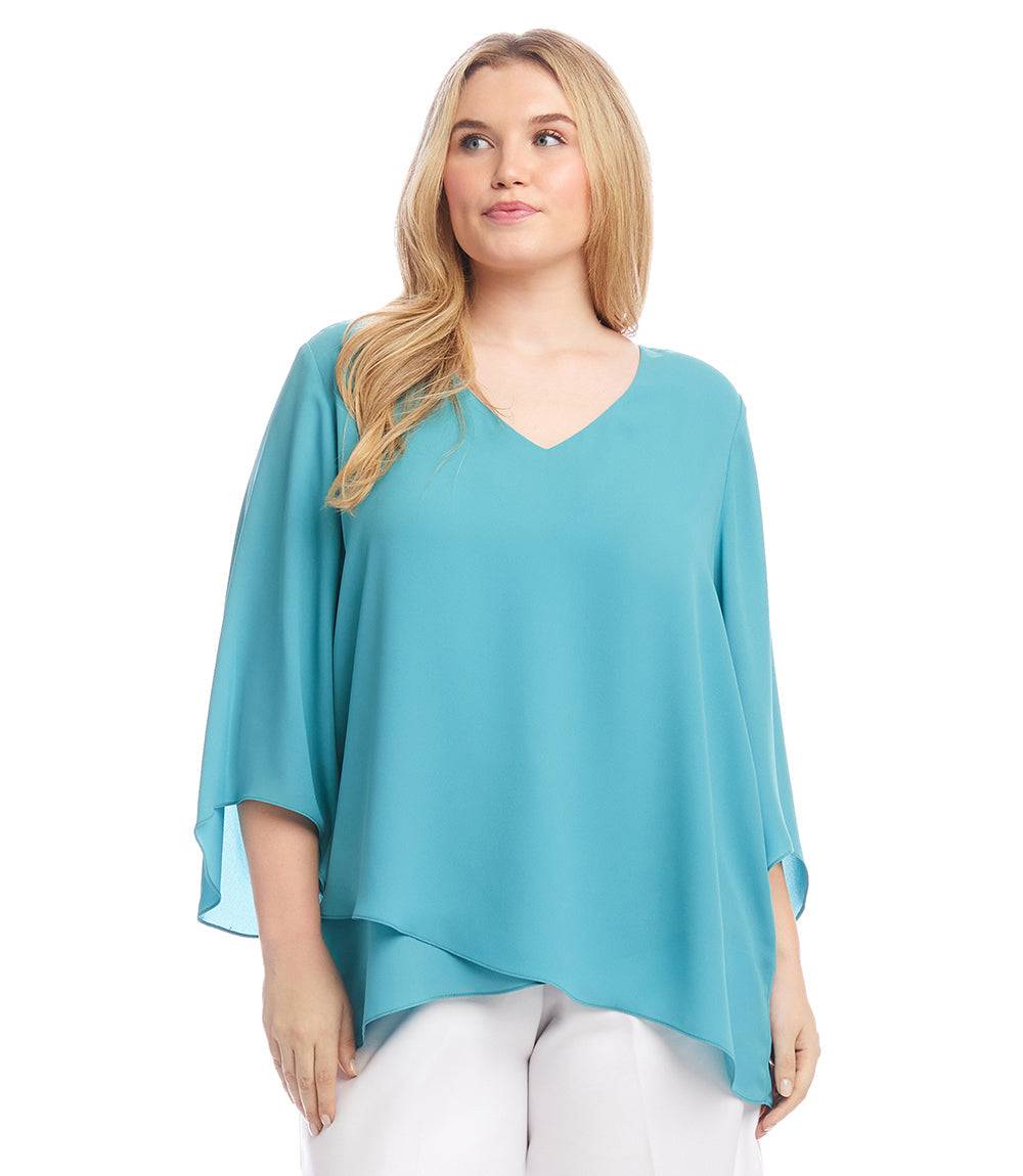 Plus size bracelet sleeve asymmetric top in blue silky crepe with V-neck and layered hem