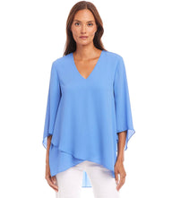 Petite size bracelet sleeve asymmetric top in blue silky crepe with V-neck and layered hem