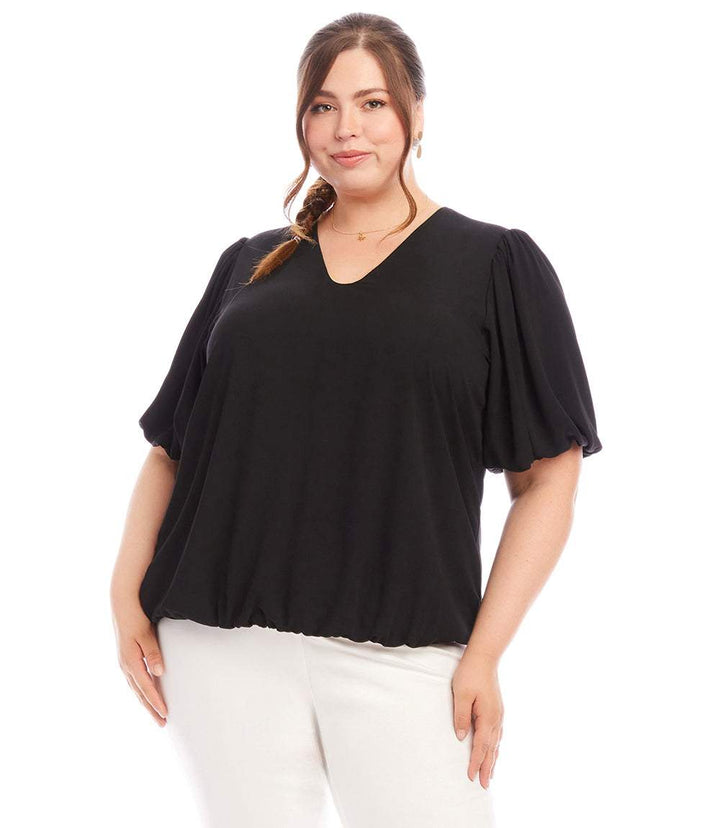Plus size black puff sleeve top with V-neck and elasticized hem in silky crepe fabric